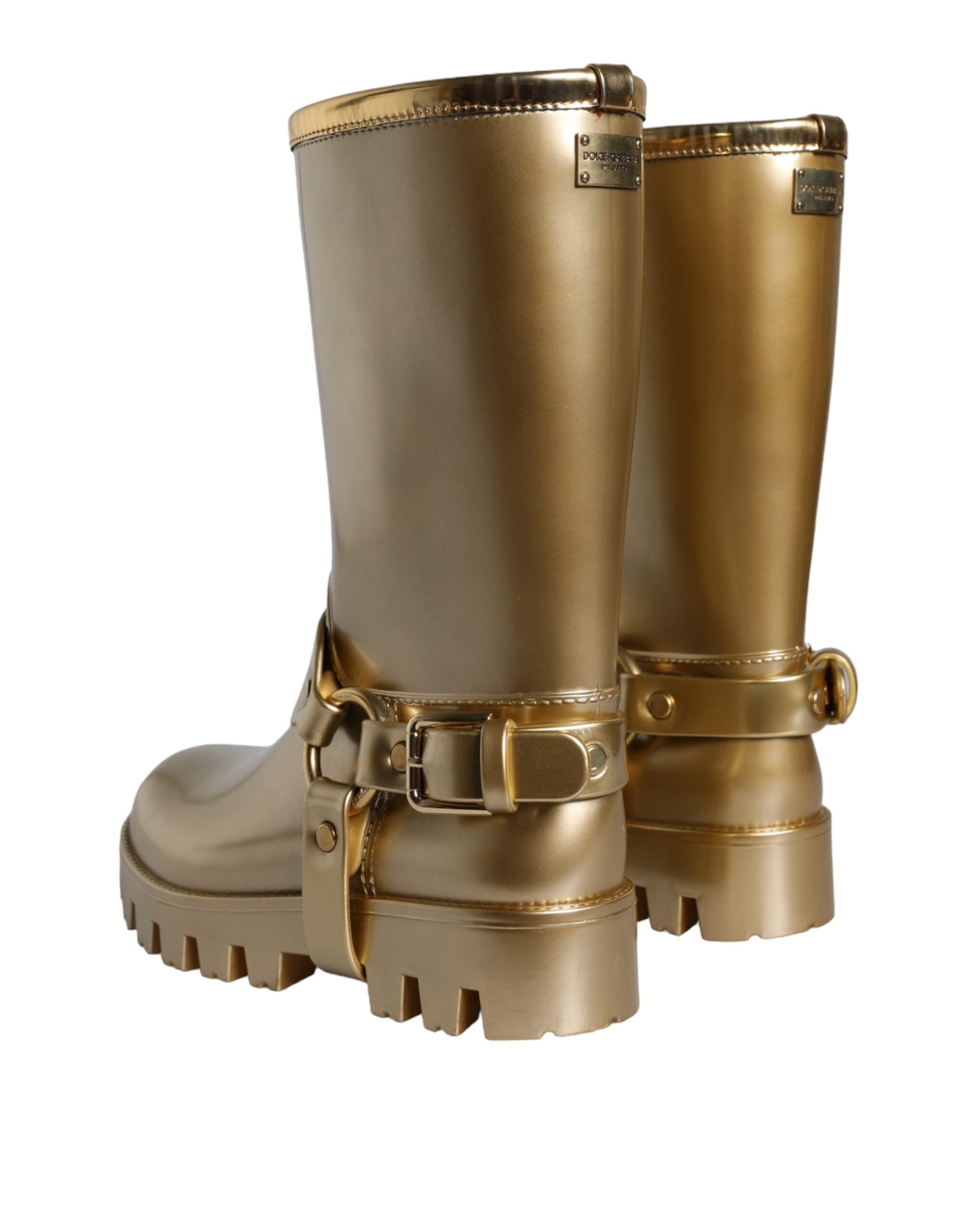 Metallic gold rubber PVC rain boots by Dolce & Gabbana with shiny finish and sturdy soles, perfect for wet weather.