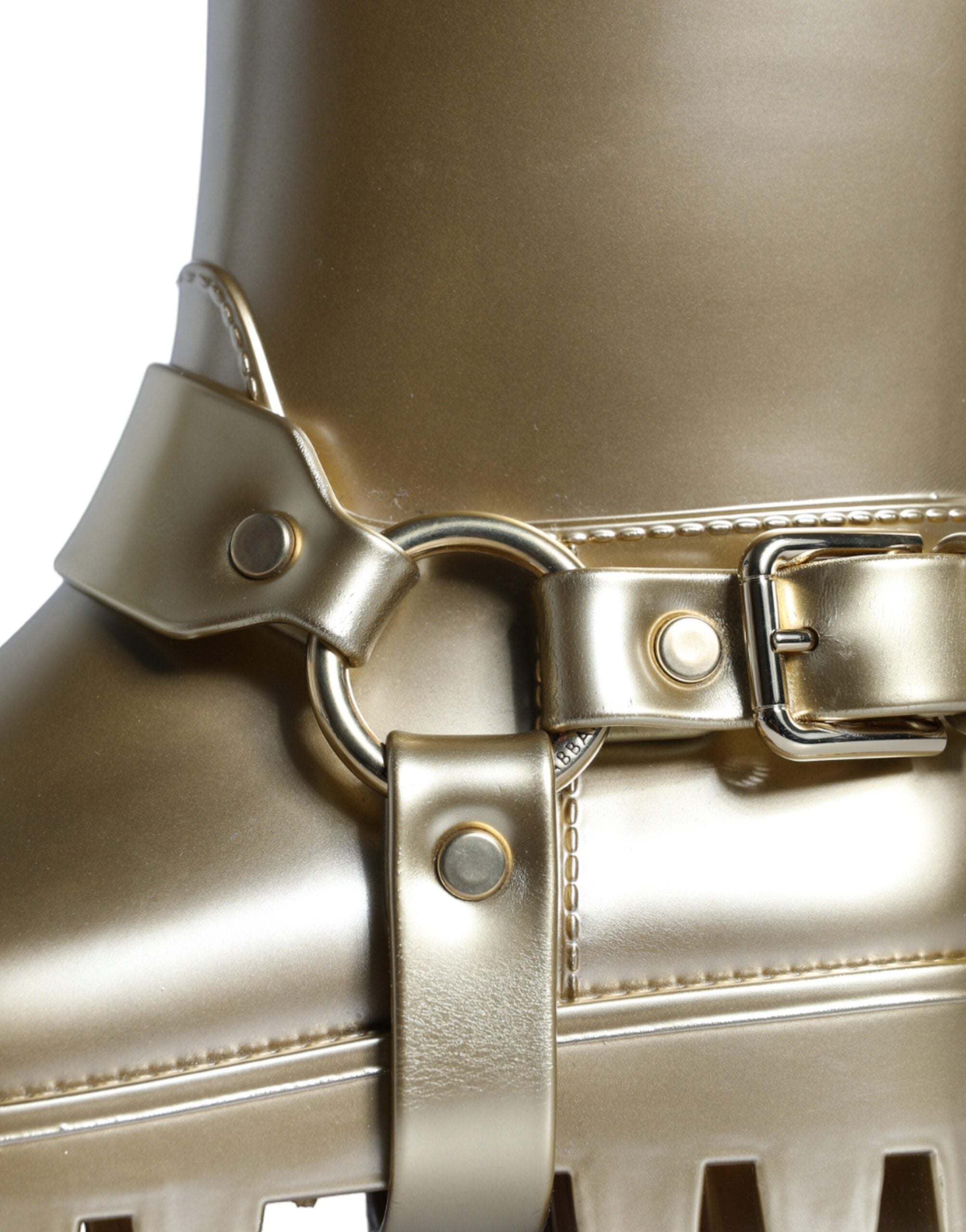 Metallic gold rubber PVC rain boots by Dolce & Gabbana, shiny waterproof footwear with a sleek, stylish design.