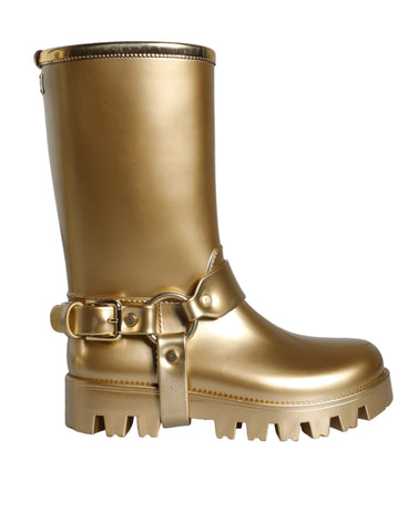 Metallic gold rubber PVC rain boots by Dolce & Gabbana with a shiny finish and classic tall design.
