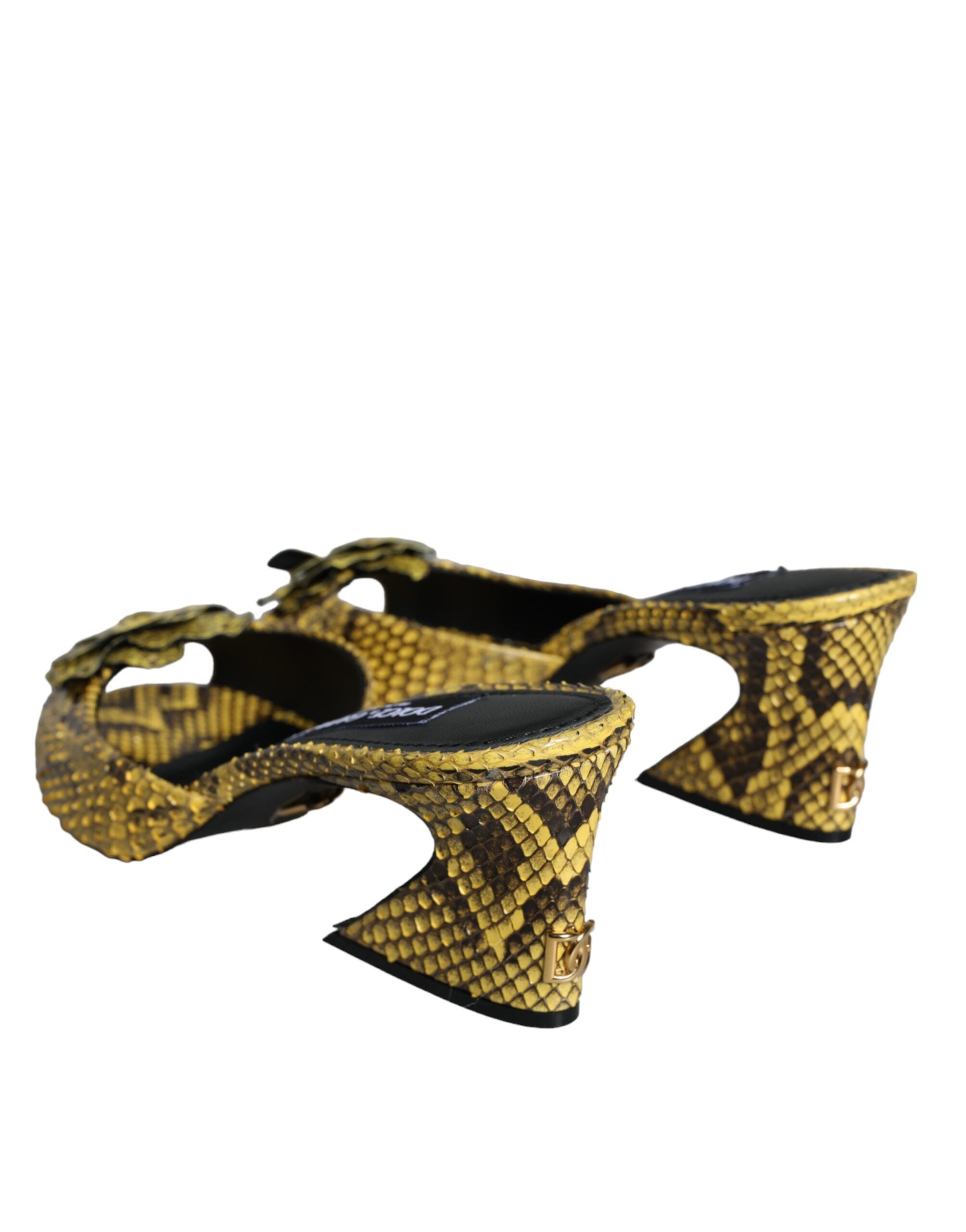 Yellow leather block heel slides by Dolce & Gabbana featuring a stylish open-toe design and comfortable slip-on style.