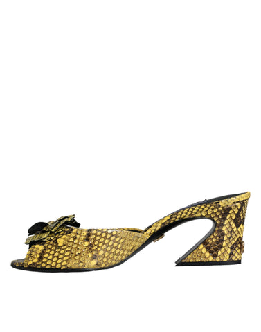 Yellow leather block heel slides shoes by Dolce & Gabbana with open toes and sleek design.