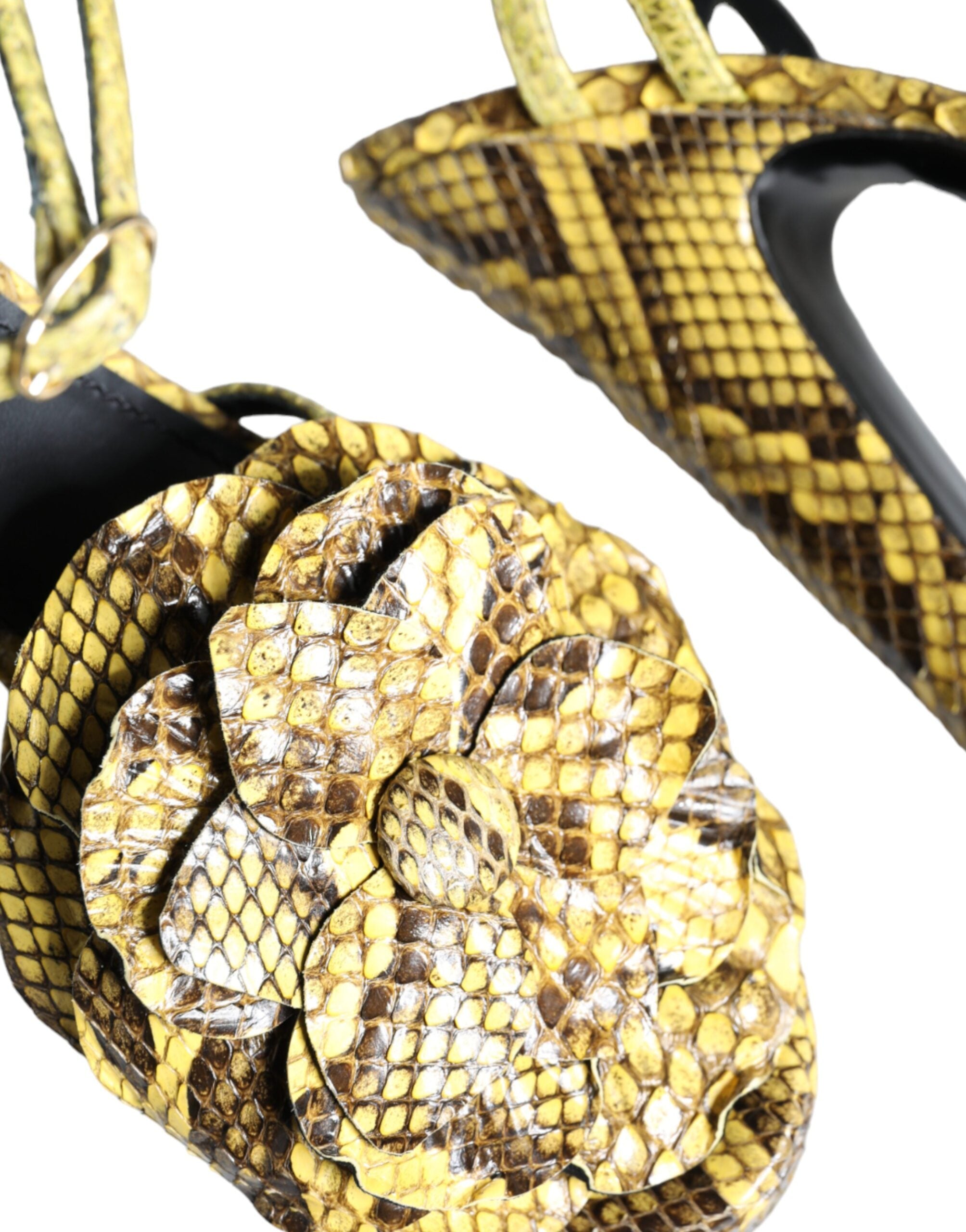 Yellow exotic leather ankle strap heels sandals by Dolce & Gabbana with stiletto heels and open toe design.