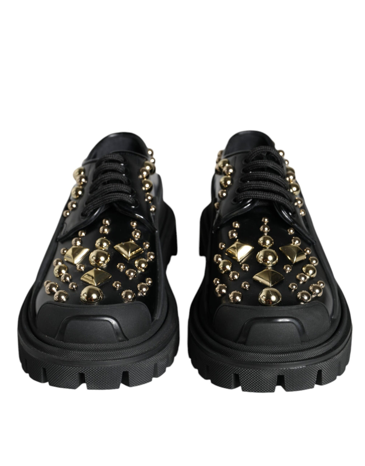 Black leather trekking derby shoes with embellishments by Dolce & Gabbana, featuring a sturdy sole and elegant design.