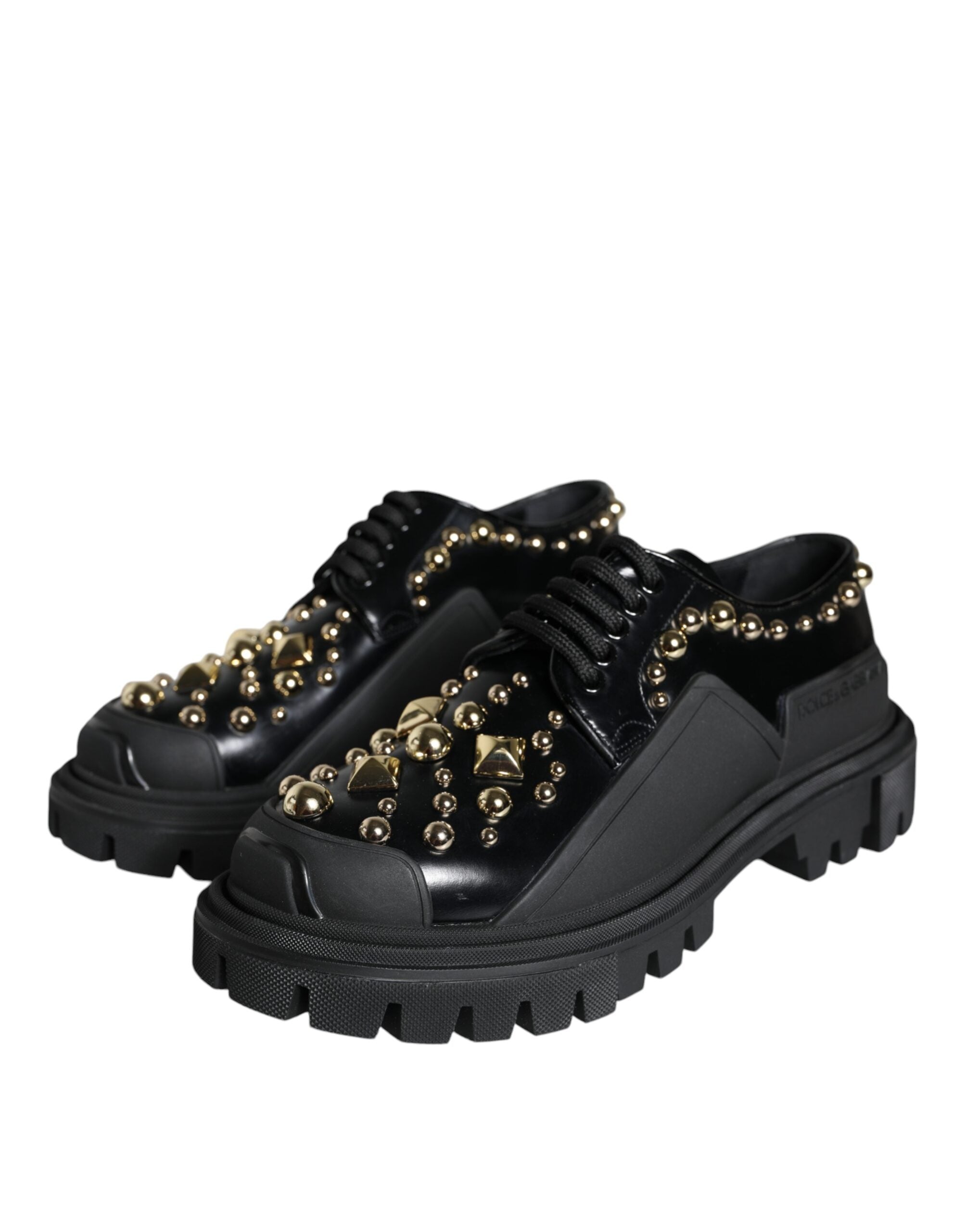 Black leather trekking derby shoes with embellishments by Dolce & Gabbana, featuring sturdy design and detailed accents.
