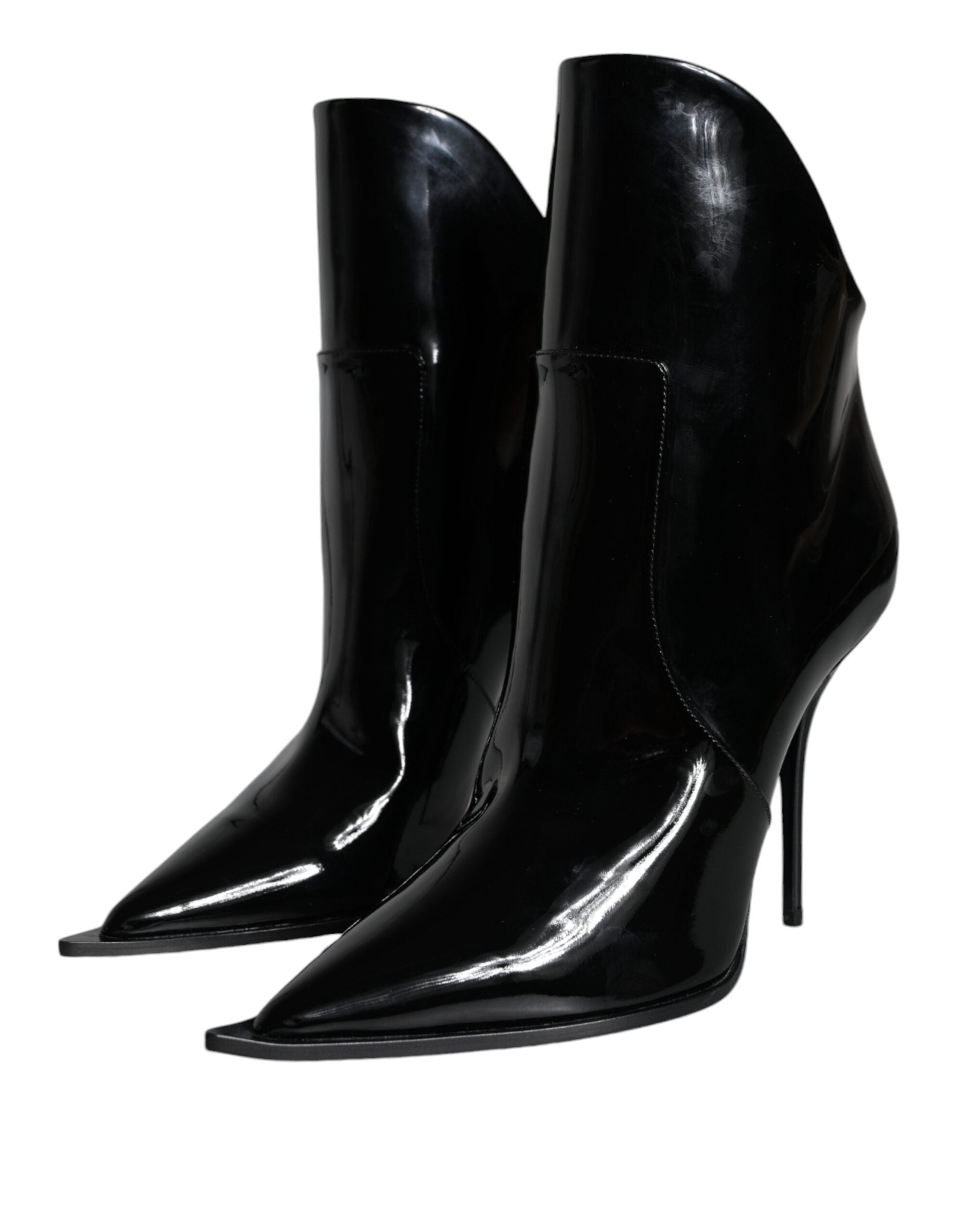 Black patent leather pointed ankle boots by Dolce & Gabbana, featuring sleek design and stylish ankle-length cut.