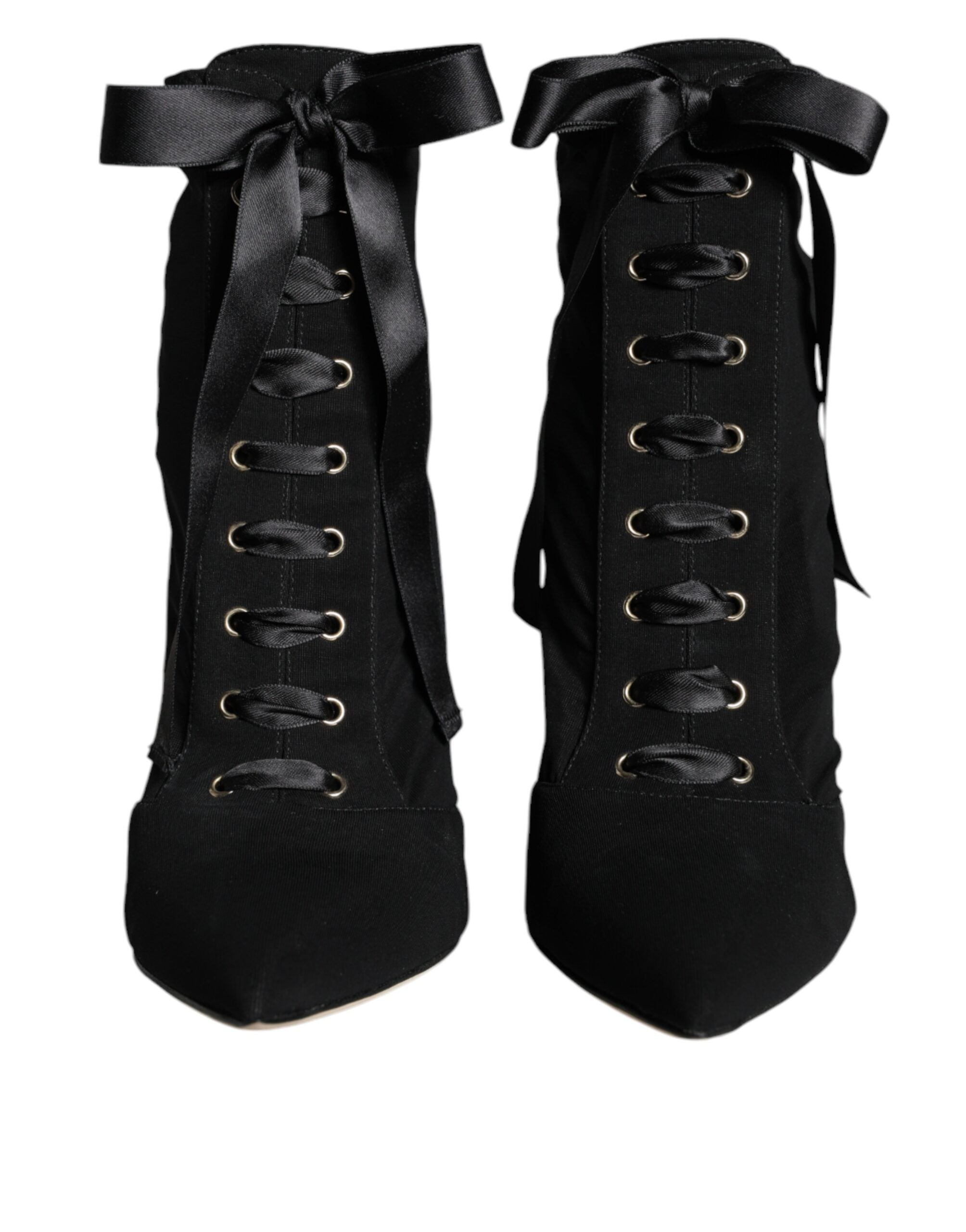Black jersey stretch ankle booties by Dolce & Gabbana, featuring sleek design and pointed toes.