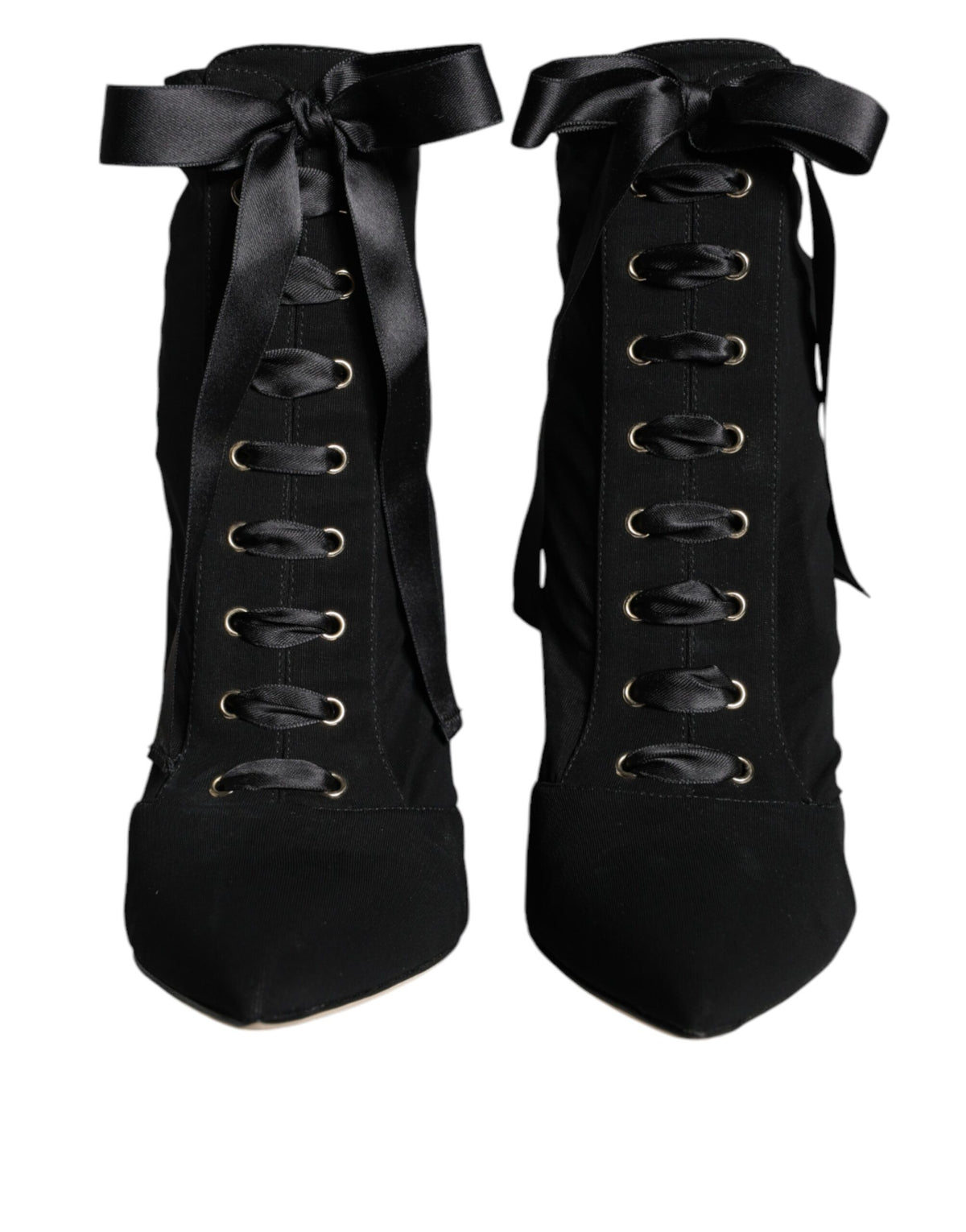 Black jersey stretch ankle booties by Dolce & Gabbana, featuring sleek design and pointed toes.