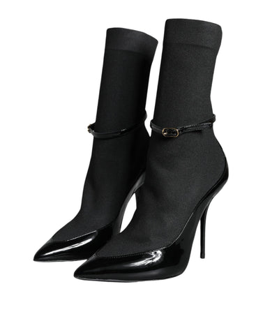 Black leather Dolce & Gabbana stiletto booties with high heels and sock-style design, stylish and sleek footwear.