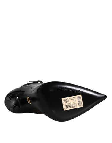 Black leather Dolce & Gabbana stiletto booties with socks design, featuring pointed toes and sleek high heels.