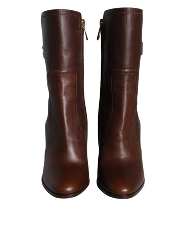 Dolce & Gabbana brown leather mid-calf heels and boots, stylish women's shoes with a sleek design and pointed toe.
