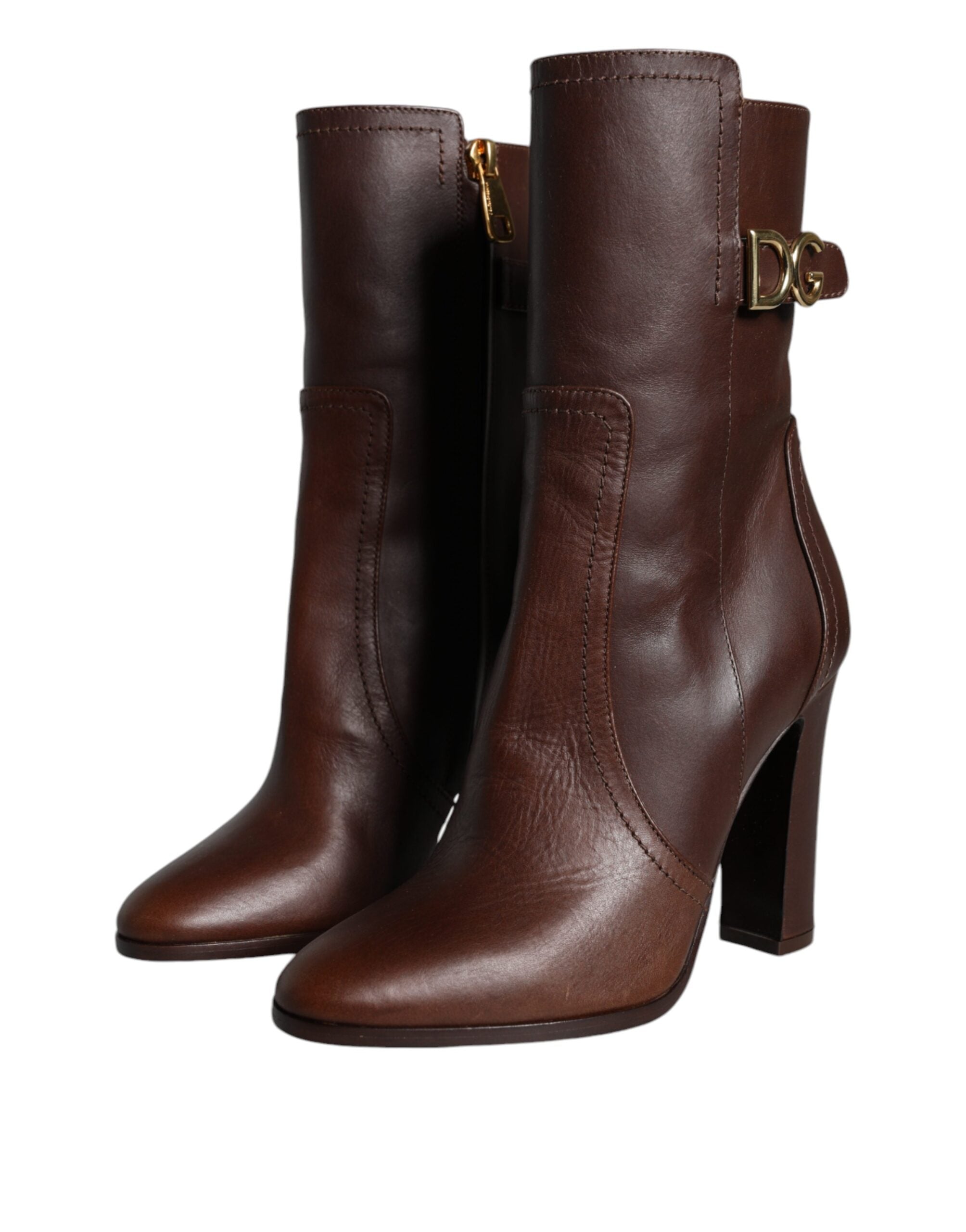 Brown leather mid-calf heel boots by Dolce & Gabbana featuring sleek design and stylish ankle-high silhouette.