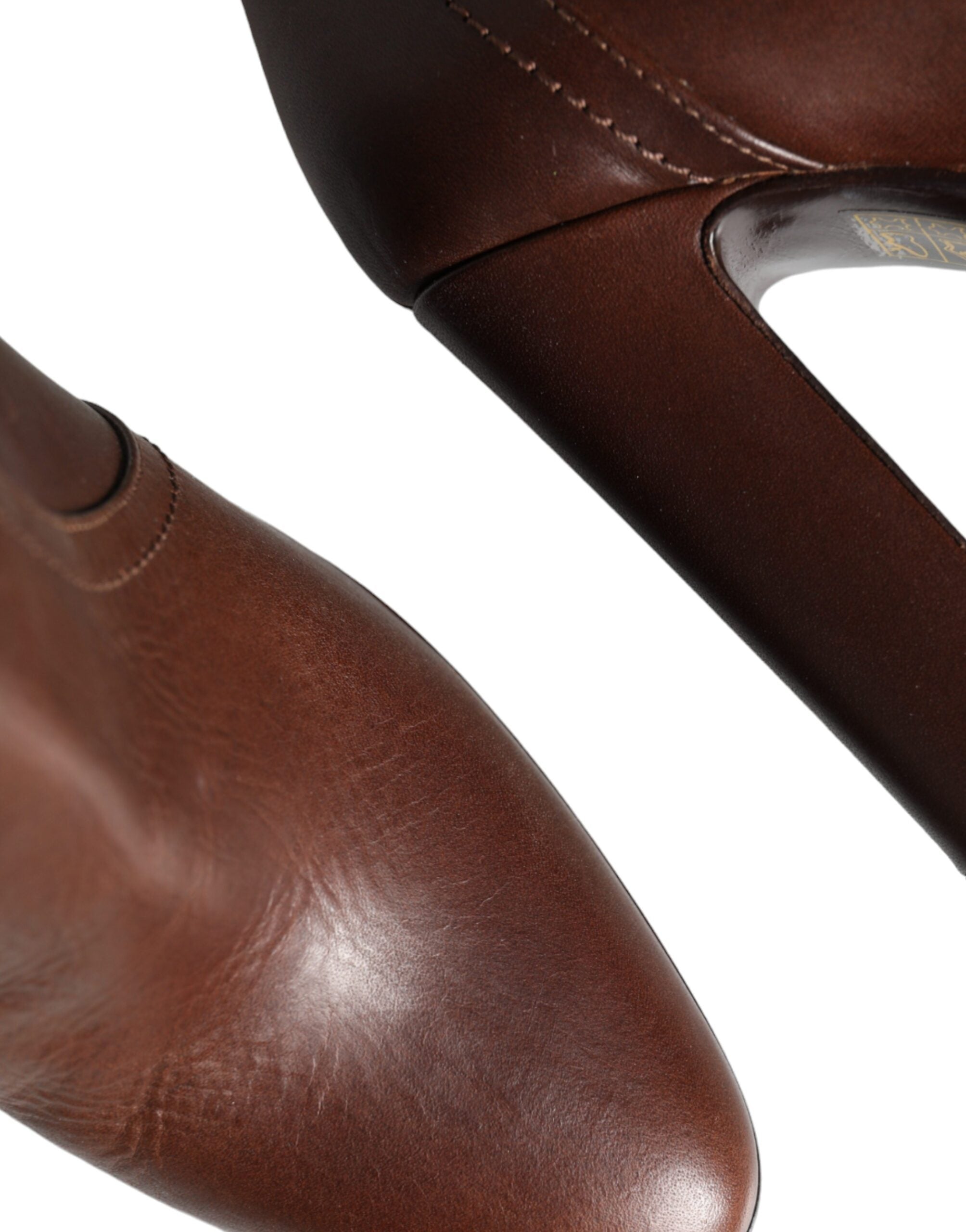Brown leather Dolce & Gabbana mid-calf heels boots with sleek design and pointed toe, perfect for stylish footwear.