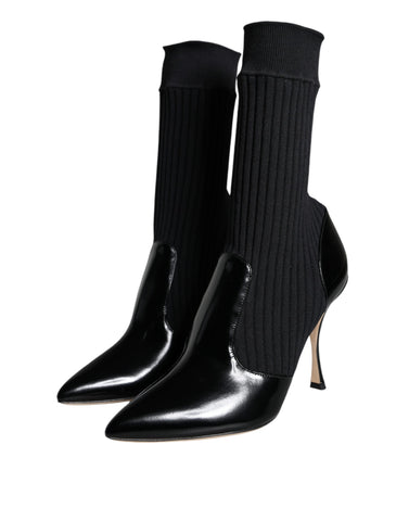 Black Dolce & Gabbana stretch stiletto booties with sock-like design, featuring sleek pointed toes and high heels.