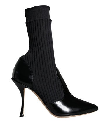 Black Dolce & Gabbana stretch stiletto booties with sock-style design, featuring sleek pointed toes and high heels.
