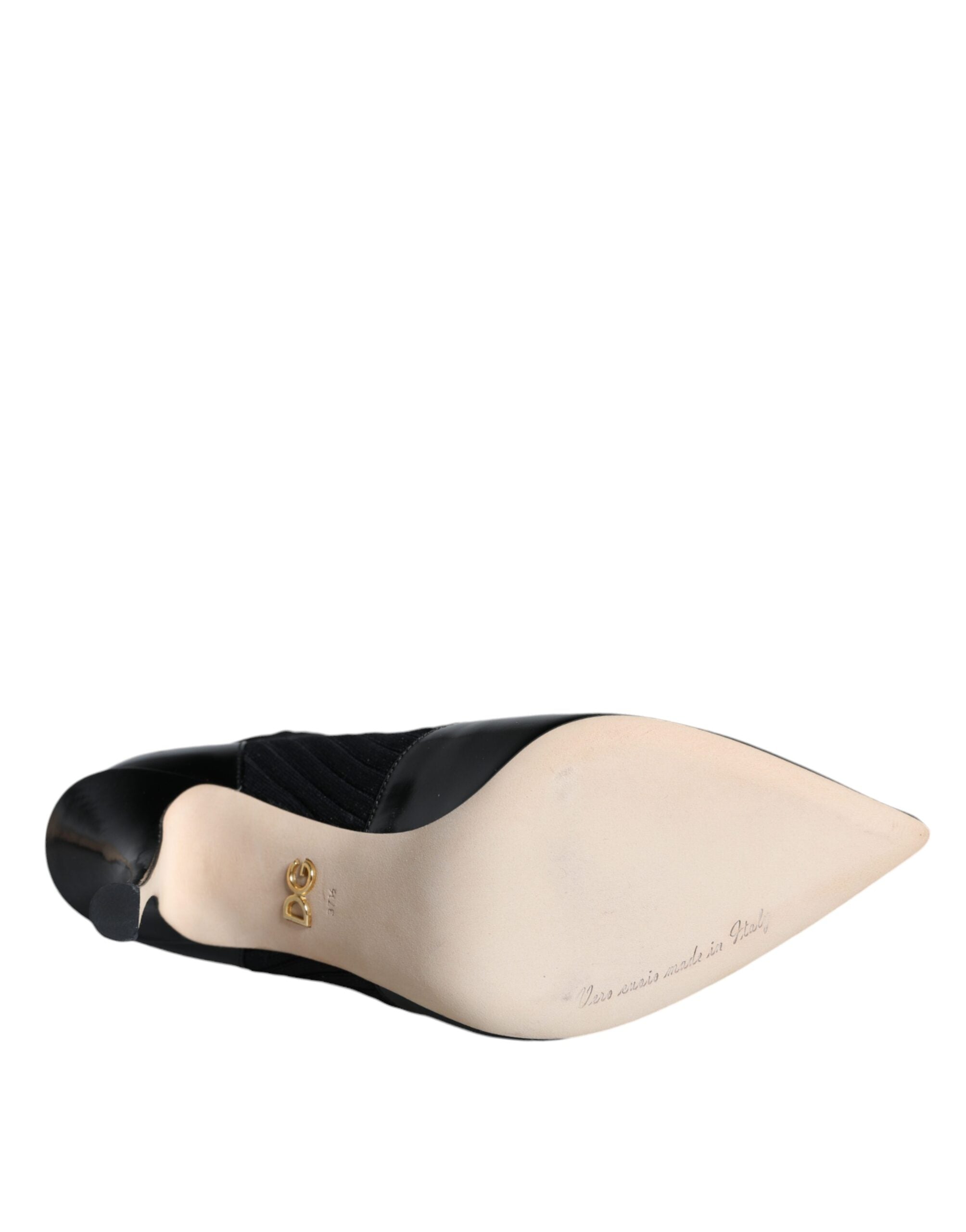Black Dolce & Gabbana stretch stiletto booties with sock-style design, featuring sleek pointed toes and high heels.