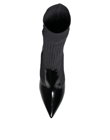 Black Dolce & Gabbana stretch stiletto booties with sock-like fit, featuring sleek pointed toes and high heels.