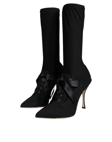 Dolce & Gabbana black stiletto heels and mid-calf boots shoes, sleek and stylish footwear with pointed toes and high heels.