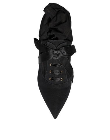 Black Dolce & Gabbana stiletto heel mid-calf boots with sleek leather finish and pointed toes, stylish footwear for women.