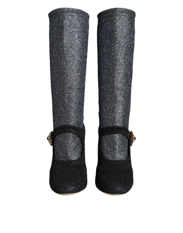 Black crystal Mary Janes booties by Dolce & Gabbana featuring a glossy finish and elegant strap design.