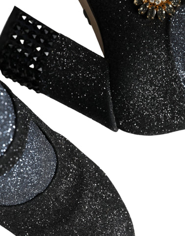 Black crystal Mary Jane booties shoes by Dolce & Gabbana with polished leather and decorative crystal embellishments.