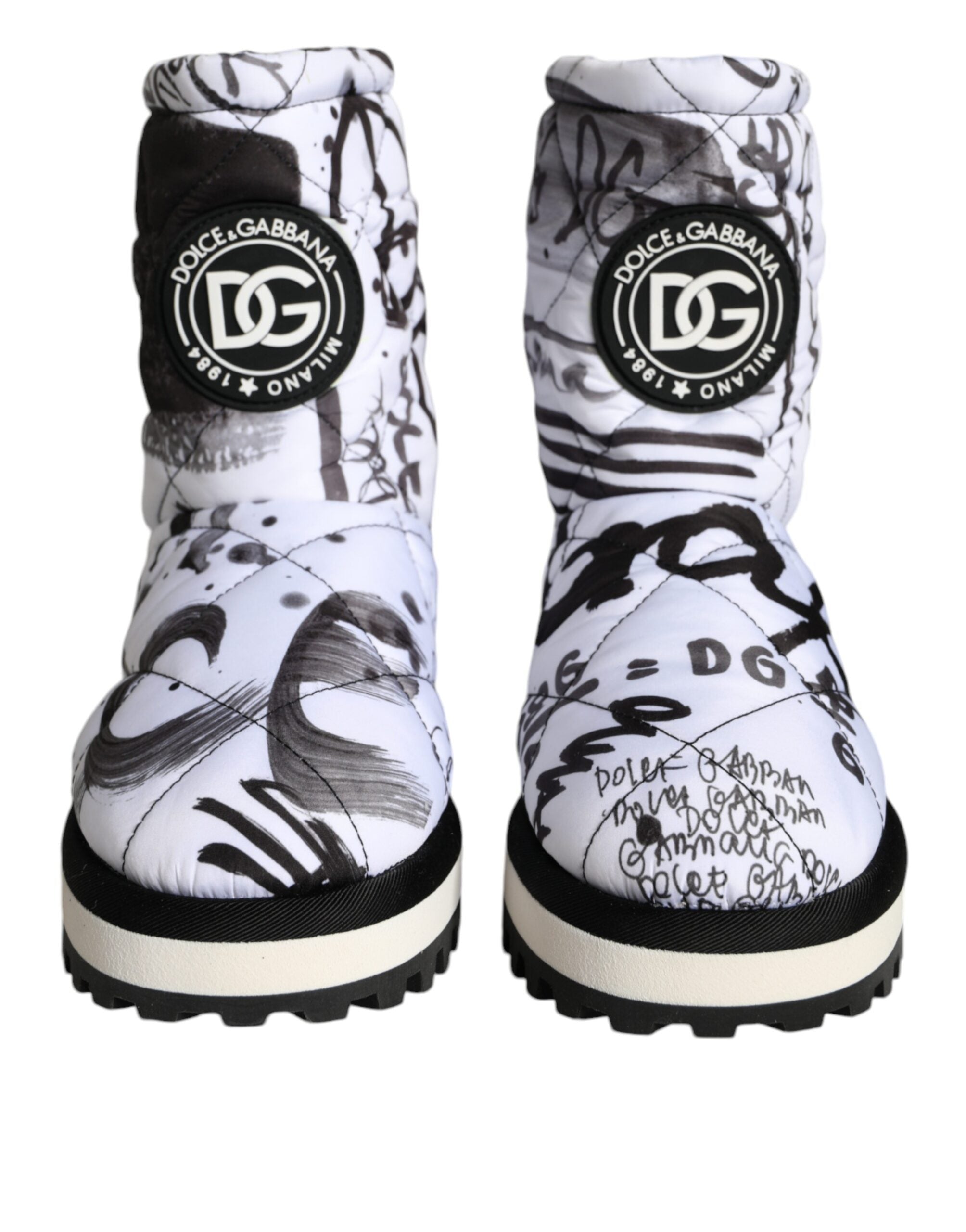 White padded logo print mid-calf boots by Dolce & Gabbana, showcasing sleek design and stylish mid-calf length.