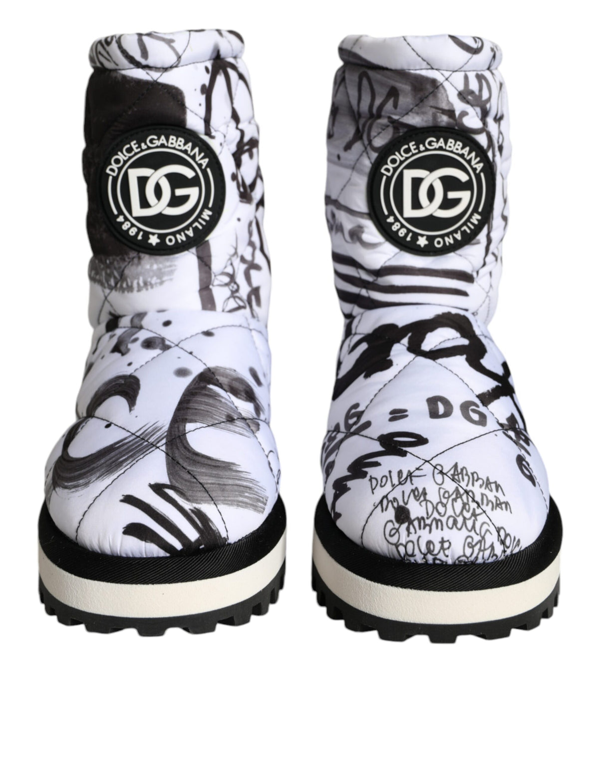 White padded logo print mid-calf boots by Dolce & Gabbana, showcasing sleek design and stylish mid-calf length.