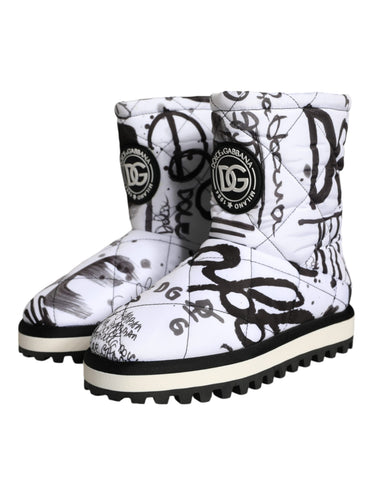 White padded Dolce & Gabbana logo print mid-calf boots with a sleek design and chunky sole, stylish and comfortable footwear.