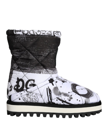 White padded logo print mid-calf boots by Dolce & Gabbana with chunky heels and stylish design, shown from the side in image 4629599.