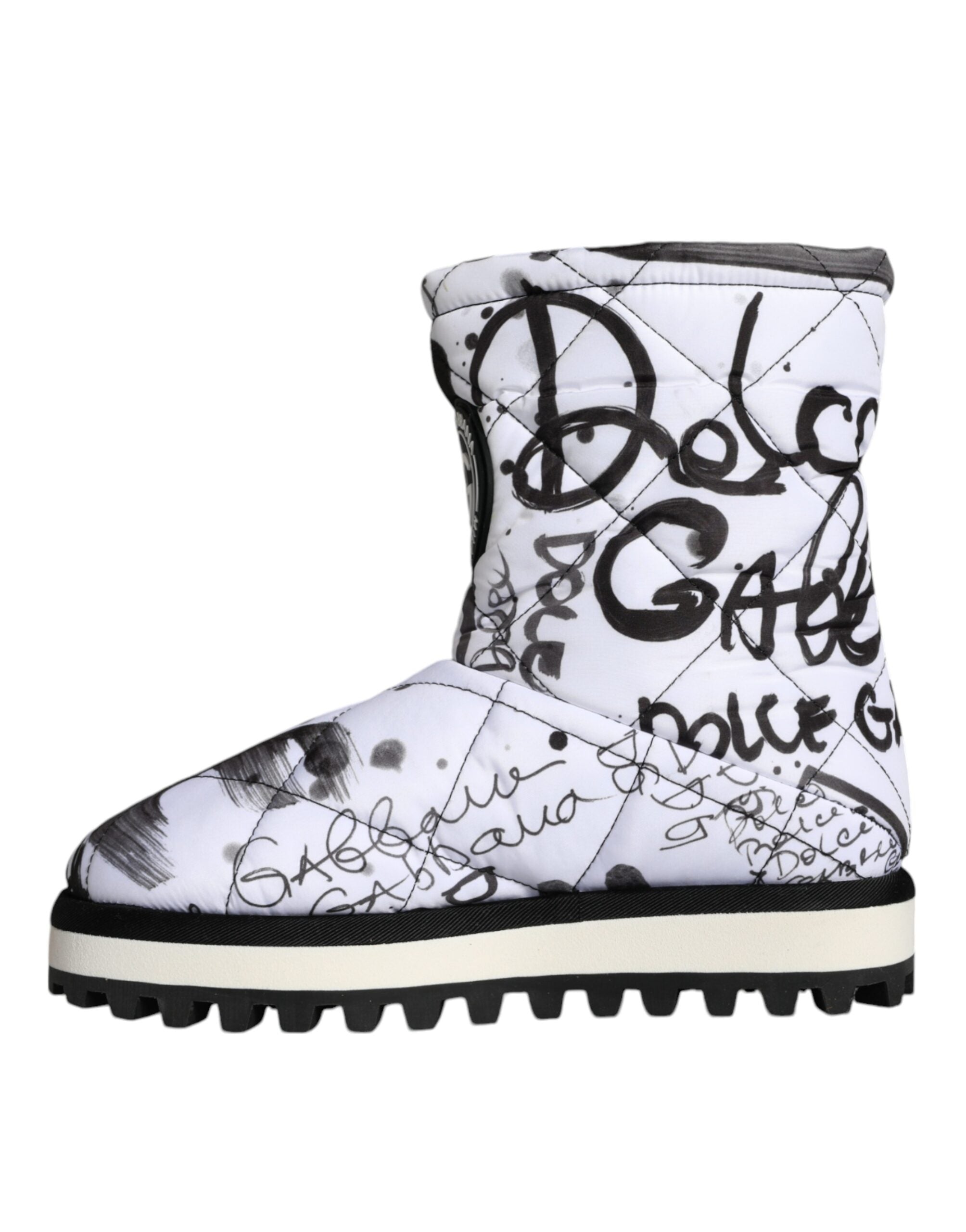 White padded logo print mid-calf boots by Dolce & Gabbana, stylish footwear featuring a sleek design and comfortable fit.