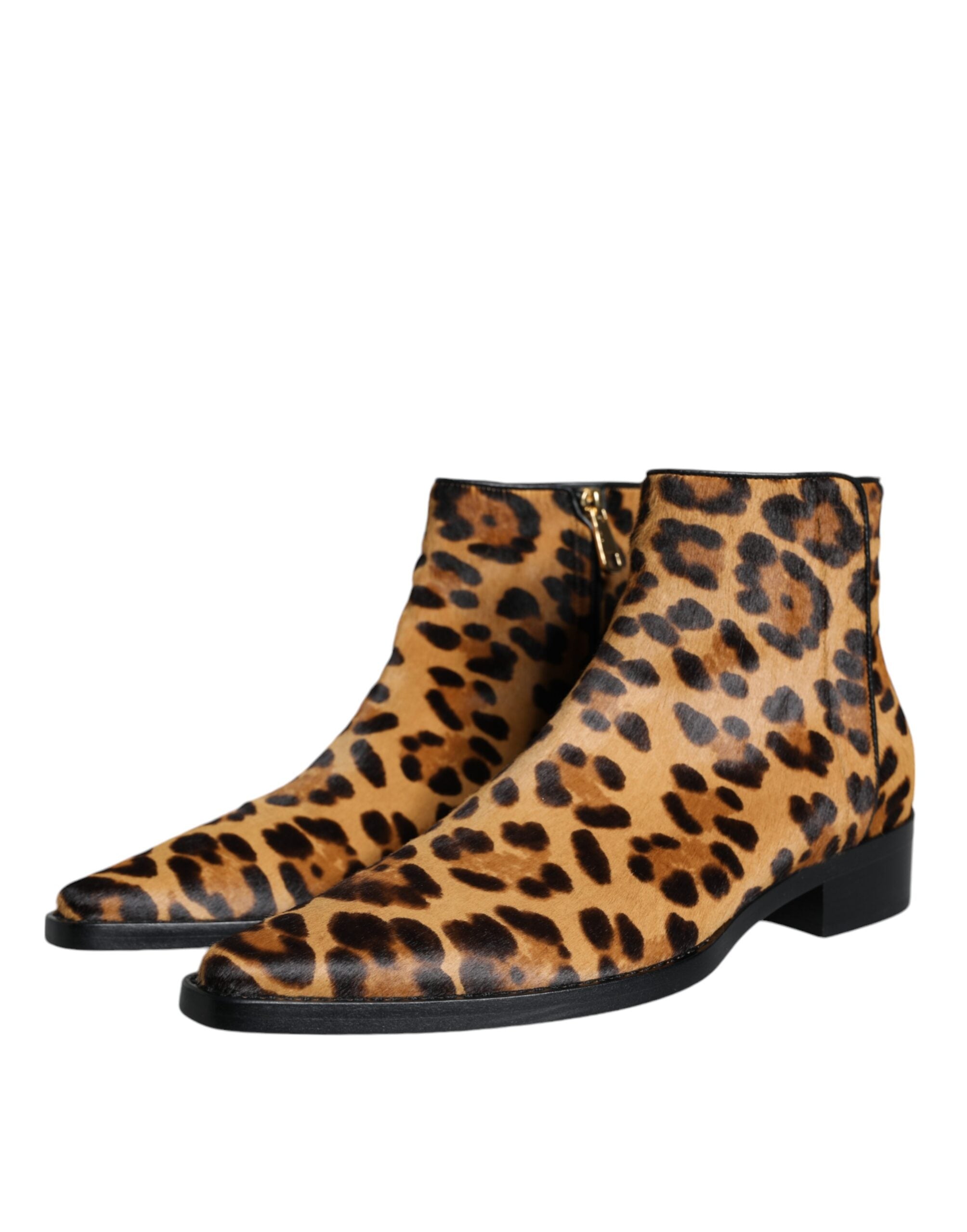 Brown leopard calf fur ankle boots by Dolce & Gabbana with pointed toes and block heels, featuring animal print and stylish design.