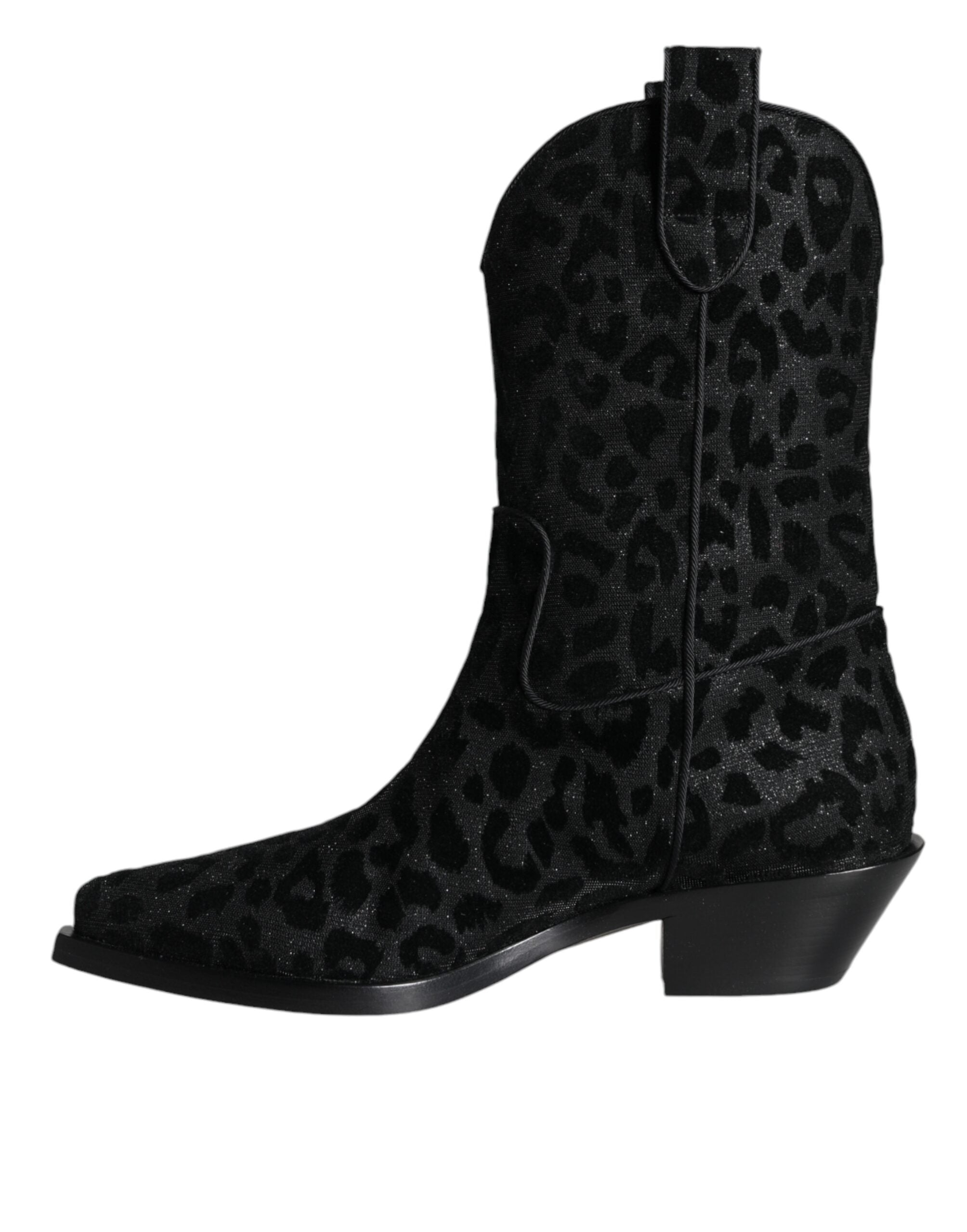 Dolce & Gabbana black and gray leopard print cowboy boots with pointed toes and western-style design.