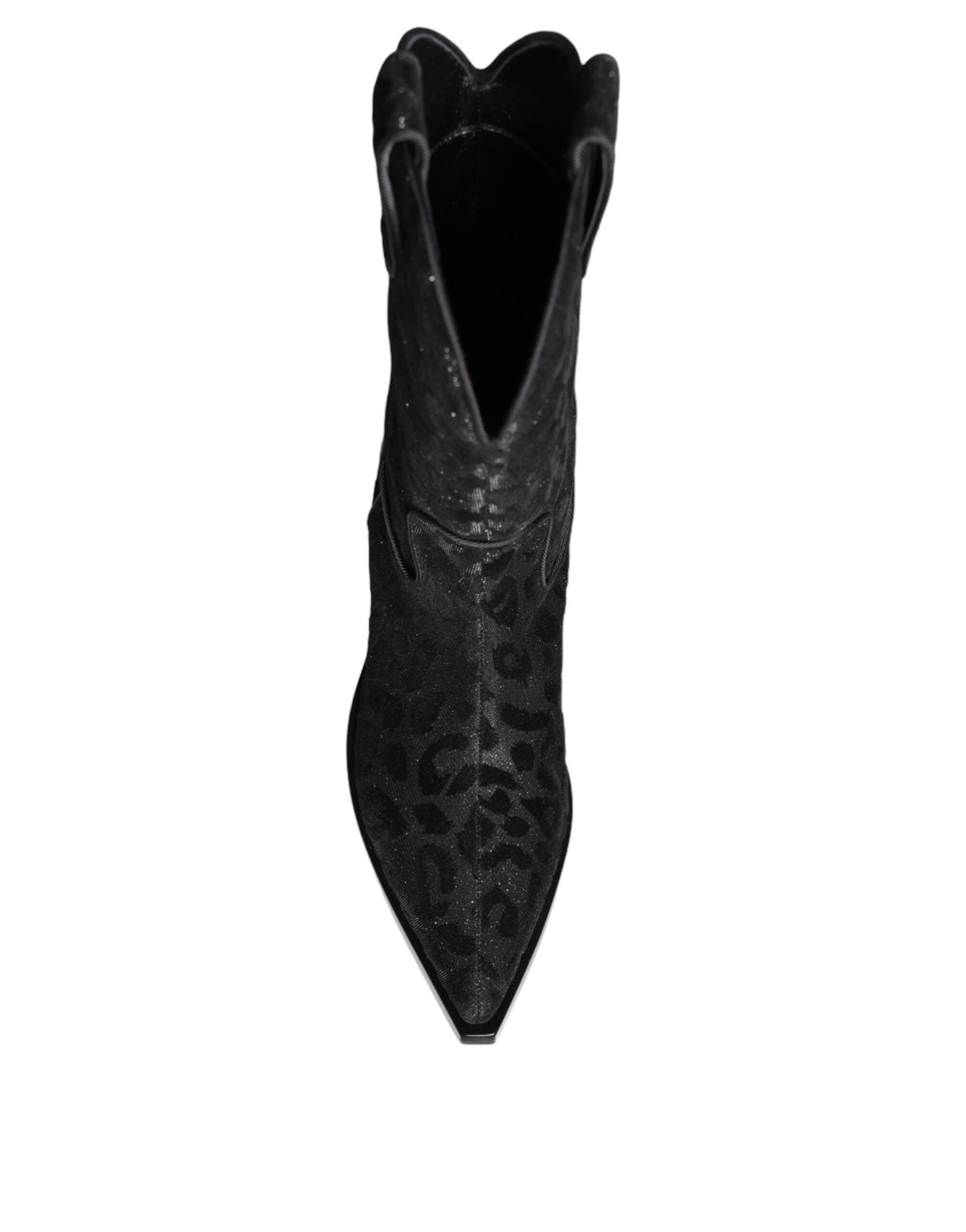 Black and gray leopard print cowboy boots by Dolce & Gabbana, featuring pointed toes and western-style heel.