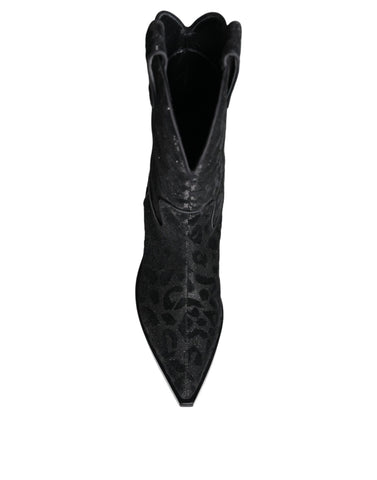 Black and gray leopard print cowboy boots by Dolce & Gabbana, featuring pointed toes and western-style heel.