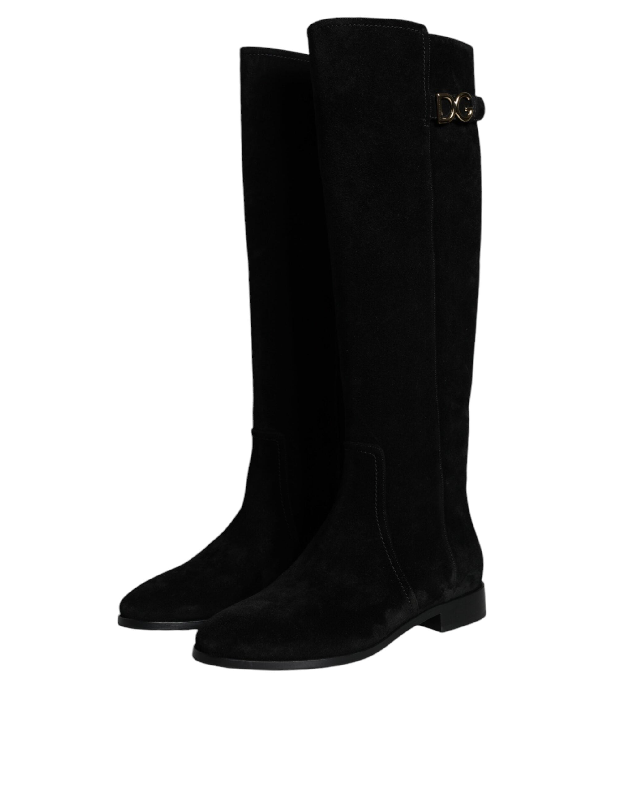 Black suede leather knee-high boots from Dolce & Gabbana with sleek design and pointed toes.