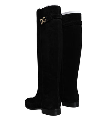 Black suede leather knee-high boots from Dolce & Gabbana featuring a sleek design and pointed toe.