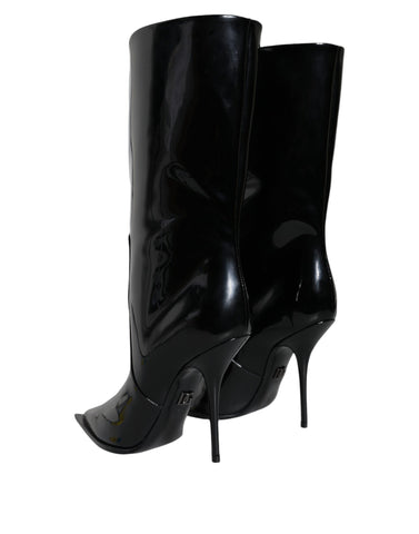 Black patent leather mid-calf boots by Dolce & Gabbana featuring a sleek, shiny finish and classic silhouette.