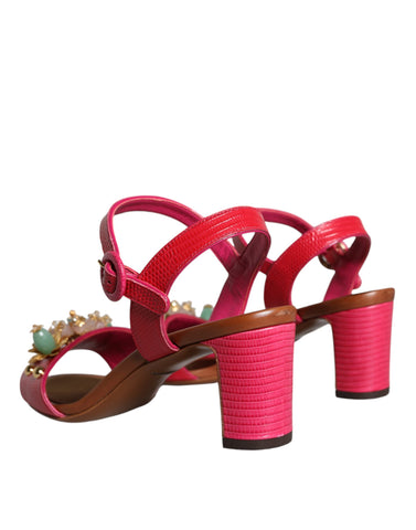 Fuchsia leather Keira sandals with embellishments by Dolce & Gabbana, featuring strappy design and decorative details.