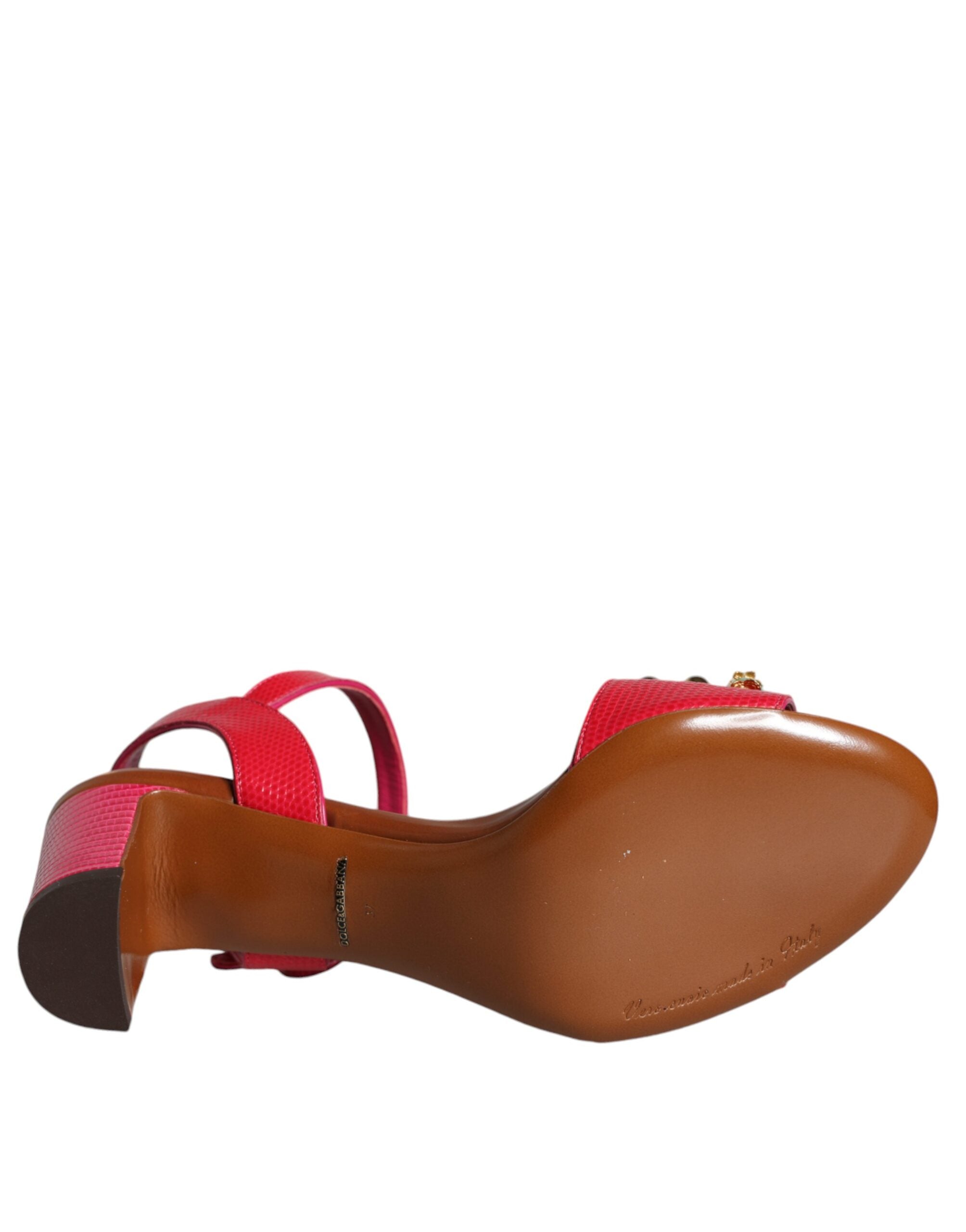Fuchsia leather Keira sandals by Dolce & Gabbana with embellished details and open toe design.