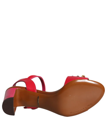 Fuchsia leather Keira sandals by Dolce & Gabbana with embellished details and open toe design.