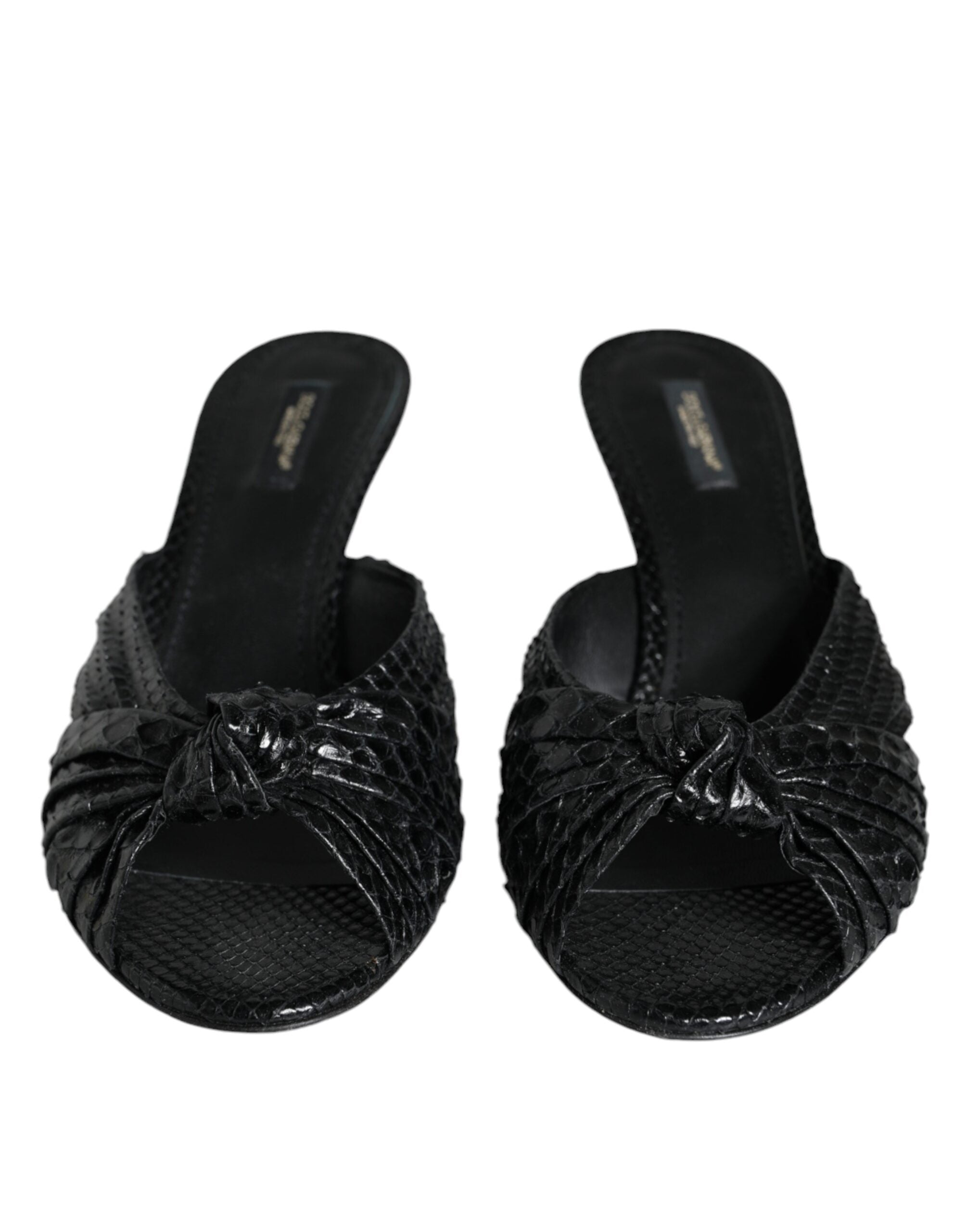 Black leather Dolce & Gabbana slide sandals with open toes and slip-on design, perfect for stylish summer footwear.