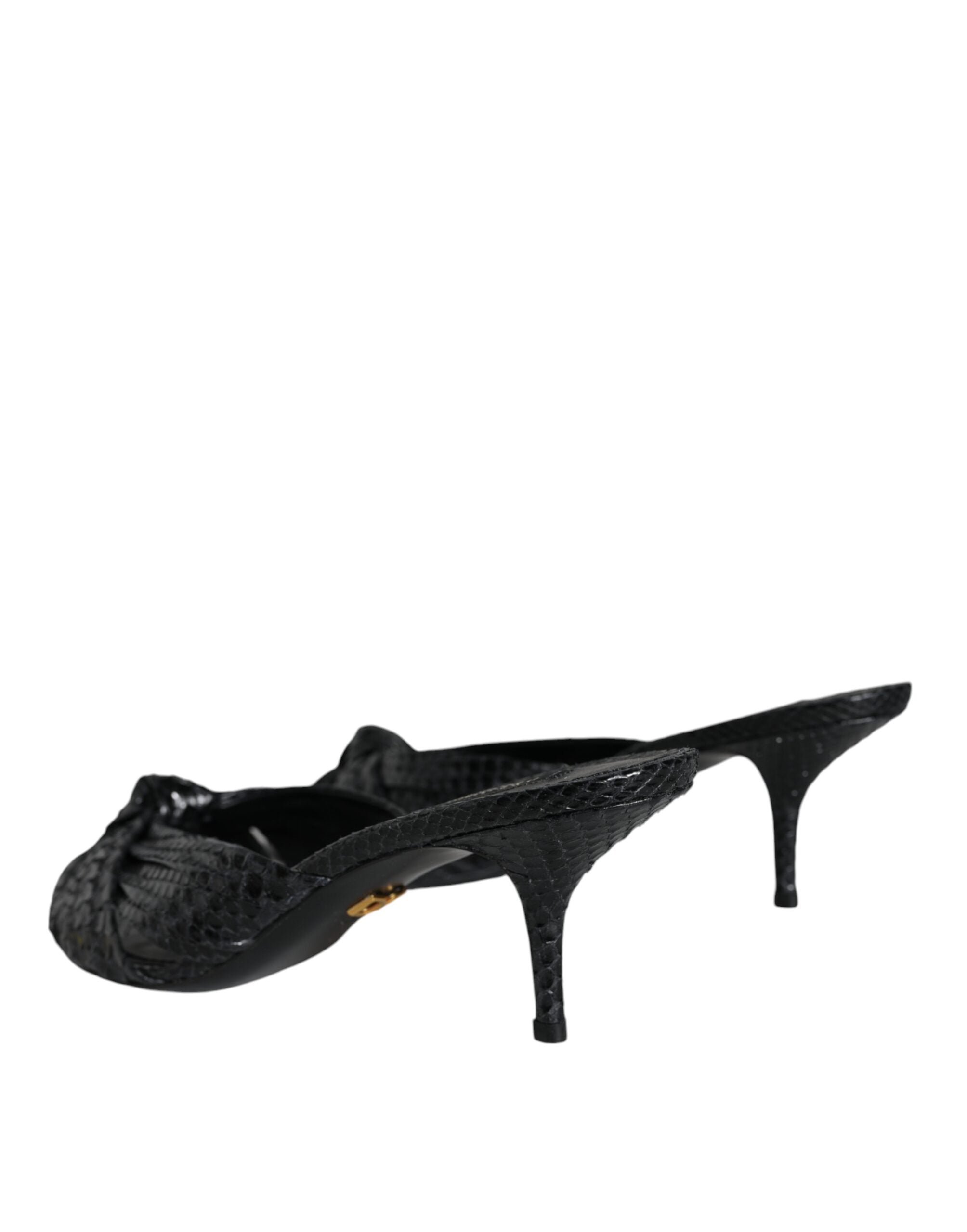 Black leather slide sandals by Dolce & Gabbana with open toe and chunky heel, showcasing sleek design and smooth leather finish.