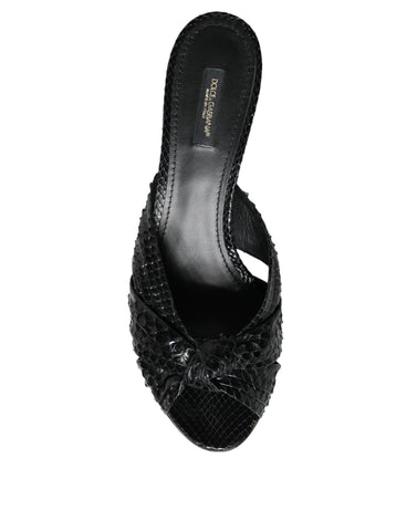 Black leather Dolce & Gabbana slide sandals with open toes and chunky heels, stylish footwear for casual or formal wear.
