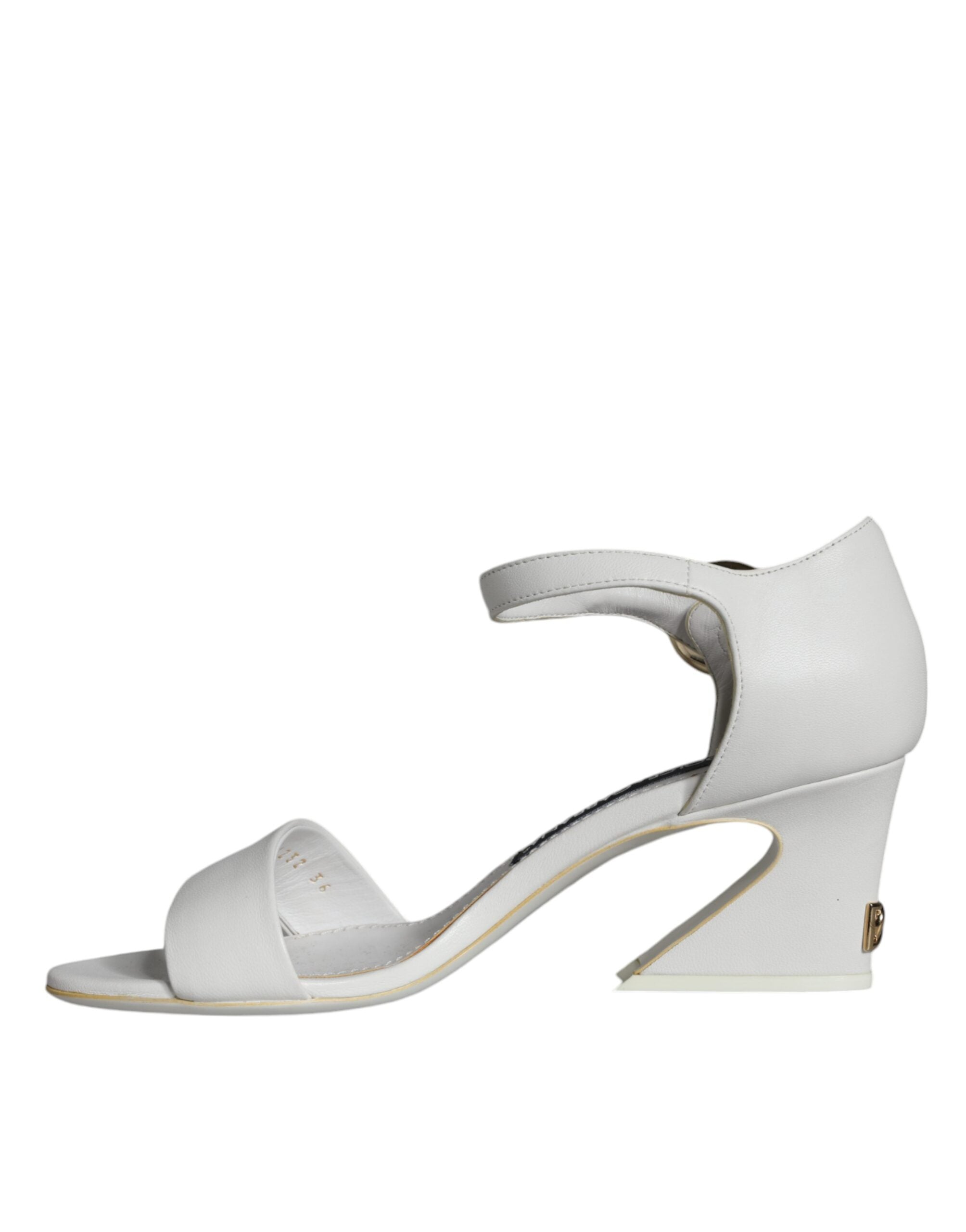 White leather Keira sandals by Dolce & Gabbana featuring sleek heels and elegant straps.