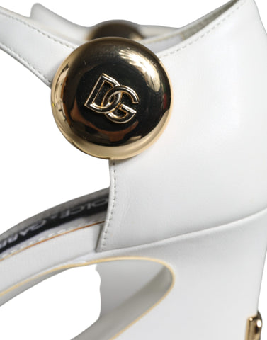 White leather Keira sandals by Dolce & Gabbana with open toes and ankle straps, stylishly displayed on a neutral background.