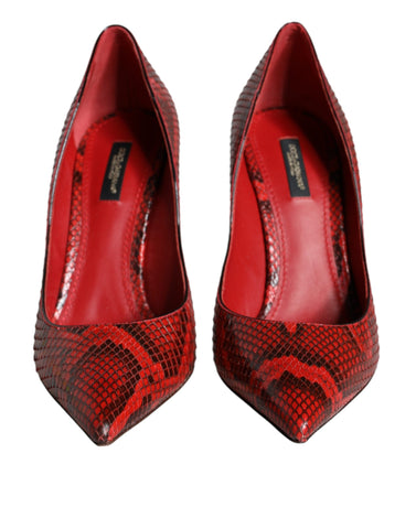 Red leather stiletto high heel pumps by Dolce & Gabbana, featuring sleek design and pointed toe.