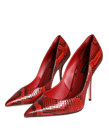 Red leather stiletto high heels pumps by Dolce & Gabbana, featuring pointed toes and sleek design.