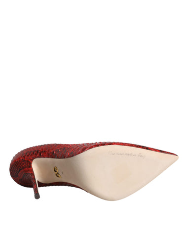 Red leather stiletto high heel pumps by Dolce & Gabbana, featuring sleek pointed toes and elegant design.
