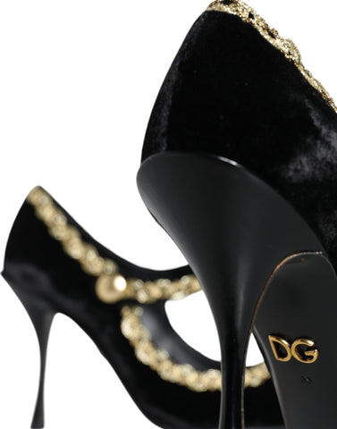 Black velvet Mary Jane pumps with gold accents, stylish Dolce & Gabbana footwear, featuring a classic strap and elegant design.