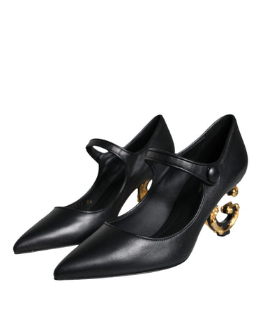 Black leather Dolce & Gabbana logo heels with Mary Jane straps and pump style, featuring a sleek and stylish design.