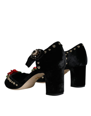 Black velvet roses ankle strap pumps shoes by Dolce & Gabbana featuring elegant floral embellishments and classic high heel design.